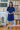 Female wearing a Blue Solid Color Shirt V-Neck Neckline Regular Collar Dress