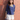 Female wearing a Blue Solid Color Fusion Round Neckline No Collar Top