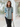 Female wearing a Greyish Blue Solid Color Ethnic No Neckline Regular Collar Tunic