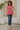 Female wearing a Peach Solid Color   Fusion Style Cowl Neckline Cotton Slub Tunic