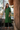 Female wearing a Green Solid Color Panel V-Neck Neckline Notched Collar Kurta