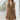 Female wearing a Mustard Solid Color Babydoll V-Neck Neckline Dress