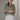 Female wearing a Sea Green Solid Color Fusion V-Neck Neckline Regular Collar Tunic
