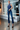 Female wearing a Blue Solid Color   Fusion Style V-Neck Neckline Cotton Slub Tunic