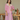 Female wearing a Baby Pink Solid Color Empire Line Notched Neckline Kurta