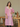 Female wearing a Baby Pink Solid Color Empire Line Notched Neckline Kurta