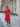 Female wearing a Red Solid Color   A-Line Style V-Neck Neckline Cotton Slub Dress