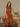 Female wearing a Rust Solid Color Tiered V-Neck Neckline Regular Collar Dress