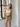 Female wearing a White Solid Color Western Strapless Neckline Top