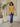 Female wearing a Yellow Solid Color   Fusion Style Asymmetric Neckline Cotton Slub Tunic