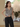 Female wearing a Grey & White Sanganeri Block Patchwork Print Western V-Neck Neckline No Collar Top