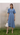 Female wearing a Greyish Blue Solid Color Empire Line V Shaped Crew Neckline Mandarin Collar Dress