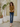Female wearing a Mustard Solid Color   Fusion Style V-Neck Neckline Cotton Slub Tunic