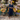 Female wearing a Black Solid Color   Pinafore Style Round Neckline Cotton Slub Kurta