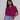 Female wearing a Pink Solid Color Fusion V-Neck Neckline Chelsea Collar Top