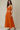 Female wearing a Orange Solid Color   Fusion Style Cowl Neckline Cotton Slub Top