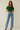 Female wearing a Green Solid Color   Fusion Style Off The Shoulder Neckline Cotton Slub Top