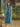Female wearing a Teal Green Solid Color Pinafore Crew Neckline Dress