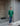 Female wearing a Green Solid Color   Fusion Style Round Neckline Cotton Slub Tunic