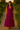 Female wearing a Wine Solid Color A-Line V-Neck Neckline Ruff Collar Dress