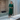 Female wearing a Green Color Kurta made from Cotton Slub Fabric.Solid print made in A-Line style with Round neckline, None collar, None lapel,  suitable for All Year and Semi-Formal occasion.