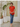 Female wearing a Orange Solid Color   Fusion Style V-Neck Neckline Cotton Slub Top