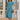 Female wearing a Ferozi Blue Solid Color Flared V-Neck Neckline No Collar Dress