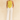 Female wearing a Yellow Solid Color Ethnic Halterneck Neckline Tunic