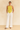 Female wearing a Yellow Solid Color Ethnic Halterneck Neckline Tunic