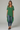 Female wearing a Green Solid Color   Fusion Style V-Neck Neckline Cotton Slub Tunic