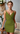 Female wearing a Greenish Rust Solid Color Wrap V-Neck Neckline Dress