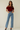 Female wearing a Maroon Solid Color   Fusion Style Off The Shoulder Neckline Cotton Slub Top