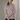Female wearing a Off-White Sanganeri, Red Floral Geometric Jaal Butta Print Fusion V-Neck Neckline No Collar Tunic
