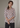 Female wearing a Off-White Sanganeri, Red Floral Geometric Jaal Butta Print Fusion V-Neck Neckline No Collar Tunic