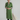 Female wearing a Greenish Rust Solid Color Kurta V-Neckline Neckline Mandarin Collar Shirt