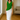 Female wearing a Greenish Rust Solid Color Western V-Neck Neckline Top