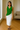 Female wearing a Greenish Rust Solid Color Western V-Neck Neckline Top