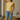Female wearing a Yellow Solid Color Western Round Neckline Top