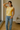 Female wearing a Yellow Solid Color Western Round Neckline Top