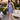 Female wearing a Purple Solid Color Bodycan Asymmetric Neckline Dress