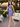 Female wearing a Purple Solid Color Bodycan Asymmetric Neckline Dress