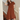 Female wearing a Rust Solid Color Pinafore Boat Neckline Dress