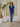 Female wearing a Blue Solid Color   Fusion Style V-Neck Neckline Cotton Slub Tunic